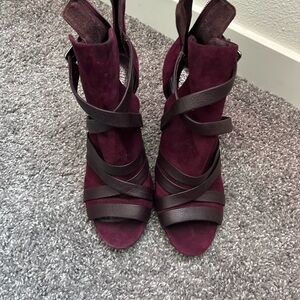 Vince Camuto Peep-Toe Booties side cutouts with a wrapping buckle & cone heel